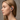 Woman wearing the Biothm VNTune EZ in-ear electrode, side view